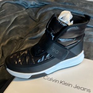 Calvin Klein black tennis shoe/boot. Size 10. NWT